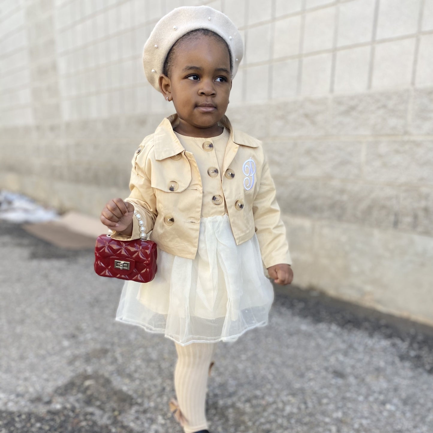 light brown dress set with jacket. tortoise buttons. tulle skirt dress